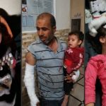 Girê Spî’de ateşkes ihlali: Bir aile bombaların hedefi oldu, çok sayıda kişi yaralandı